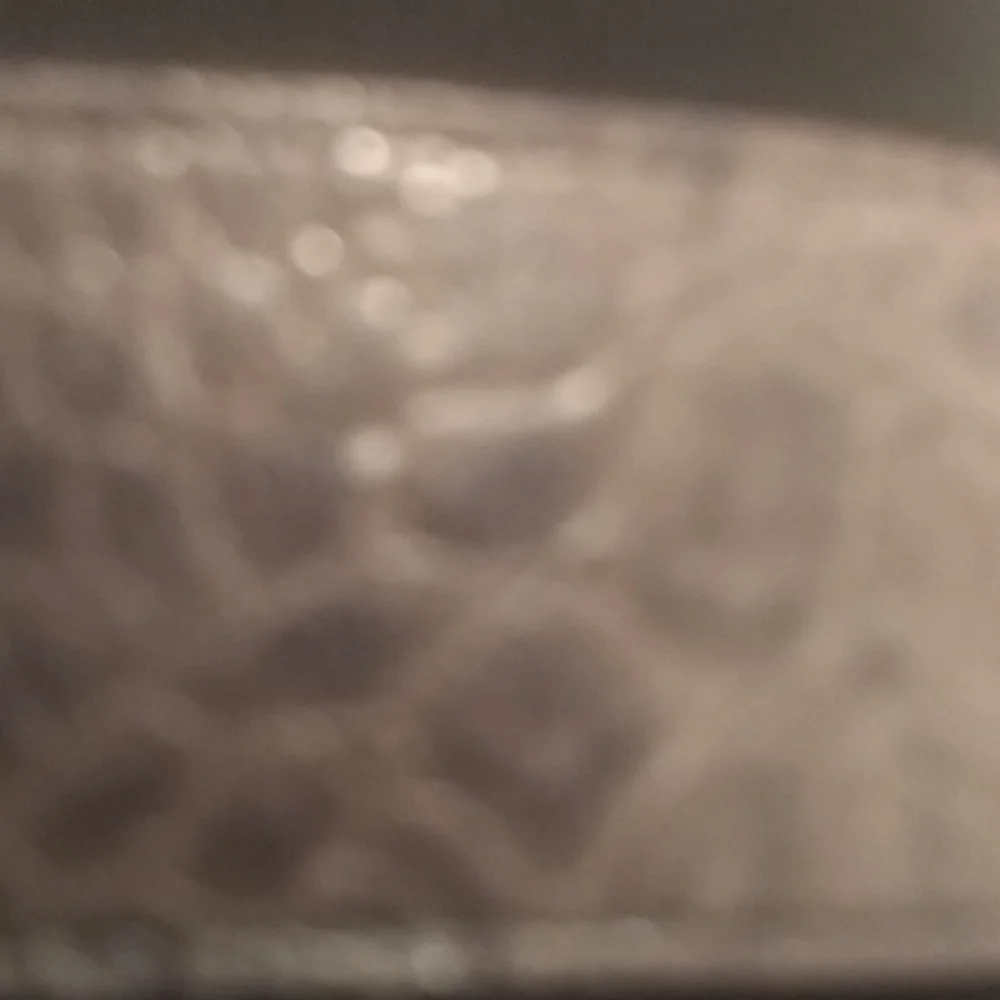 - - Manzoor leather grayish brown croc belt.